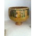 Old bowl in varnished and decorated terra-cotta